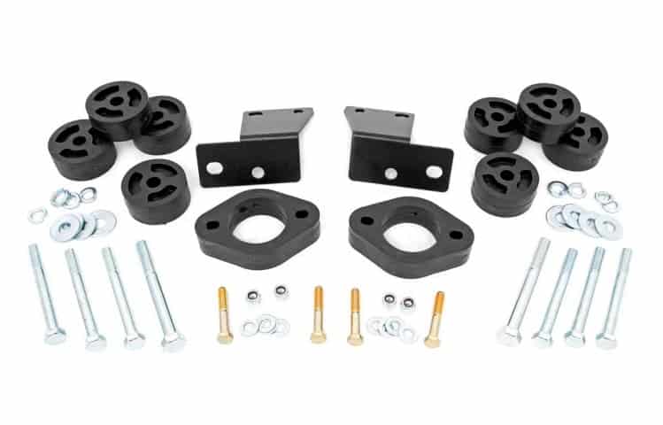 An example of lift kit components for a body lift on white background