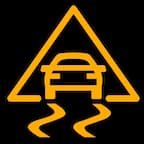 The yellow traction control warning light is shown.