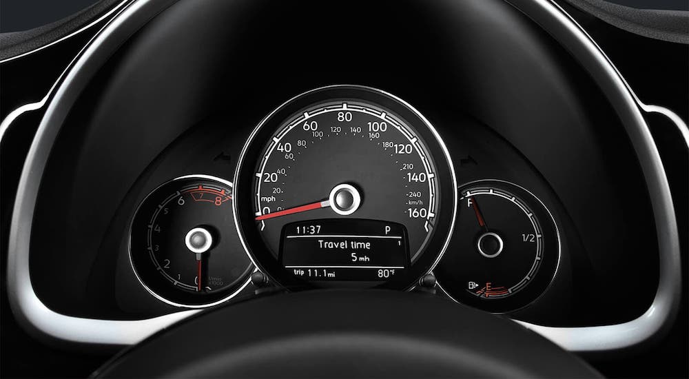 A closeup is shown of the driver information center on a 2020 Volkswagen Beetle.