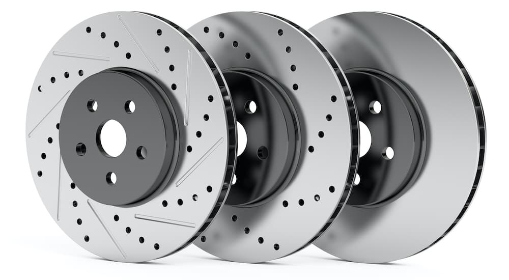 Three brake rotors are shown overlapped against a white background.