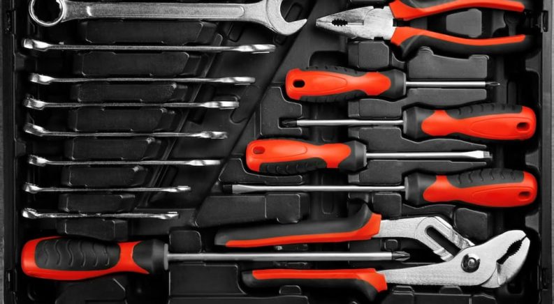 A black and red toolset is shown.