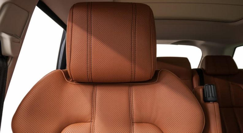 A brown passenger side headrest is shown.