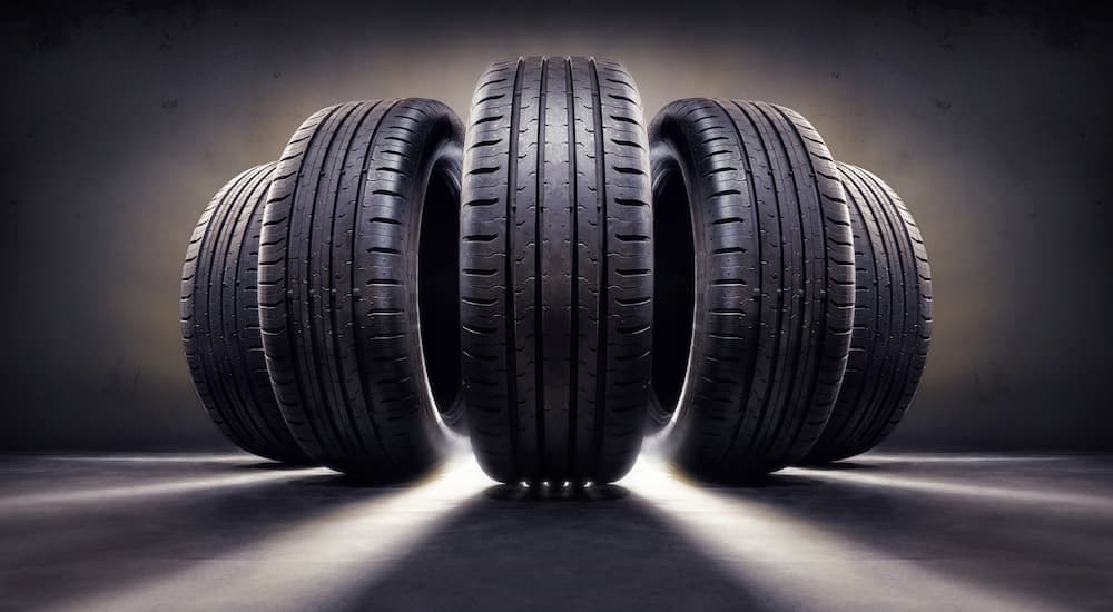 Five rubber tires are shown.