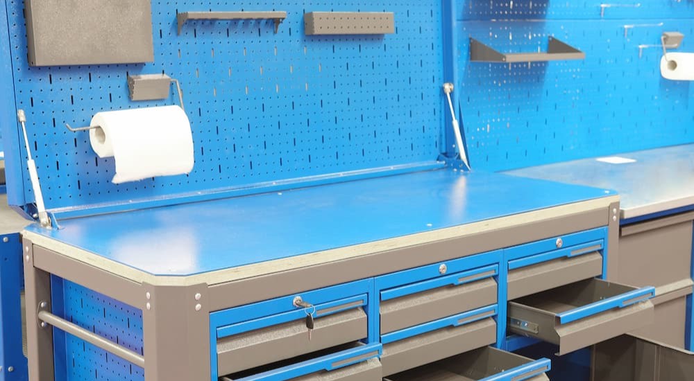 A blue and gray work bench is shown.