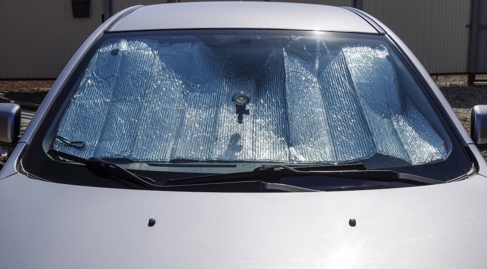 A car windshield sun shade is shown.