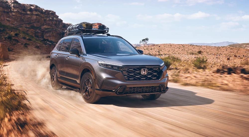 A grey 2023 Honda CR-V is shown from the front at an angle.