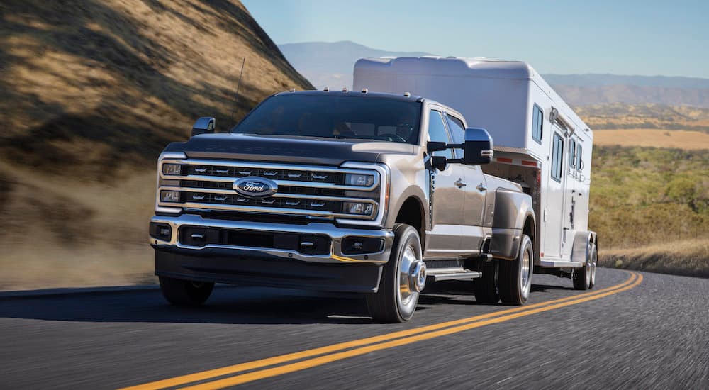 A grey 2023 Ford F-350 is shown from the front at an angle.