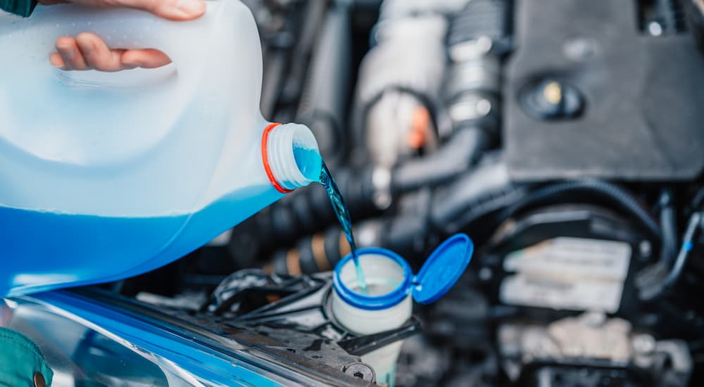 Adding window washer fluid to a vehicle
