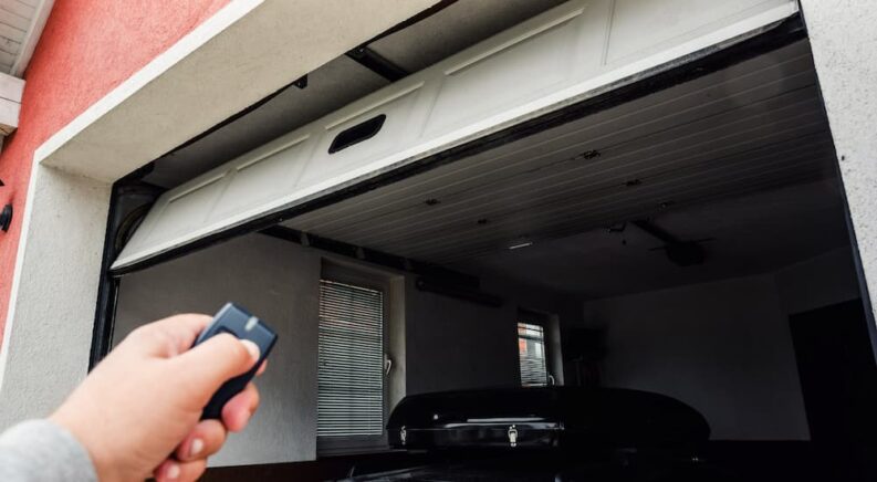 Closing the garage door on a parked vehicle