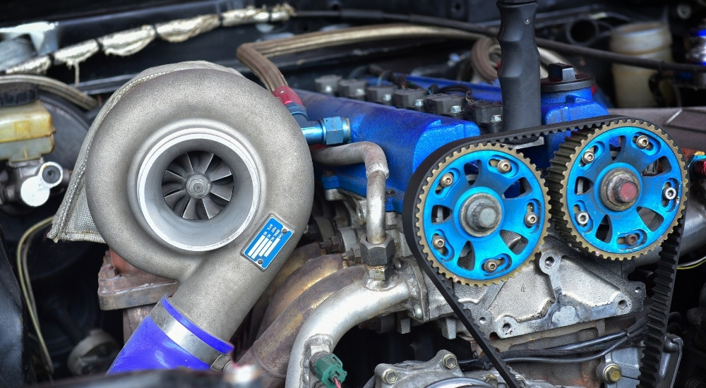 A turbo installed on an engine.