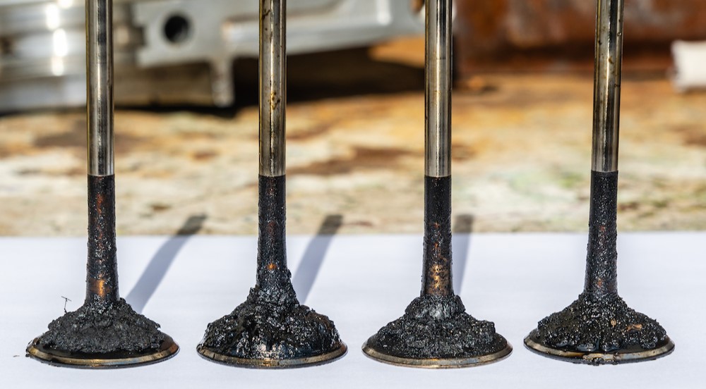 Engine valves covered in soot.