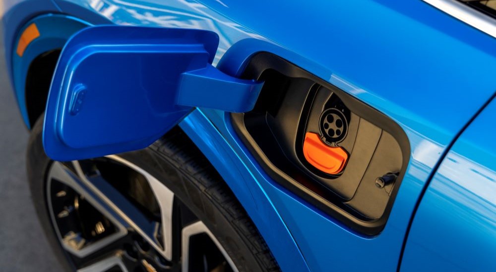 Charging port on a blue 2025 Chevy Equinox EV 3LT for sale