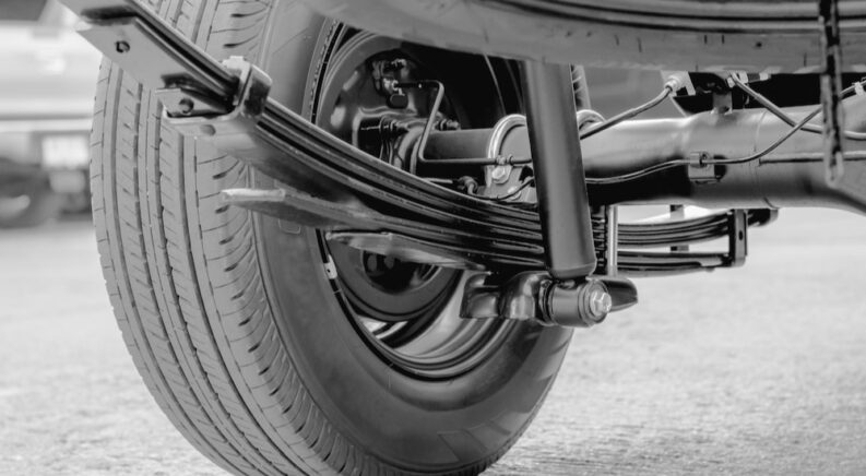 Leaf springs on a truck.