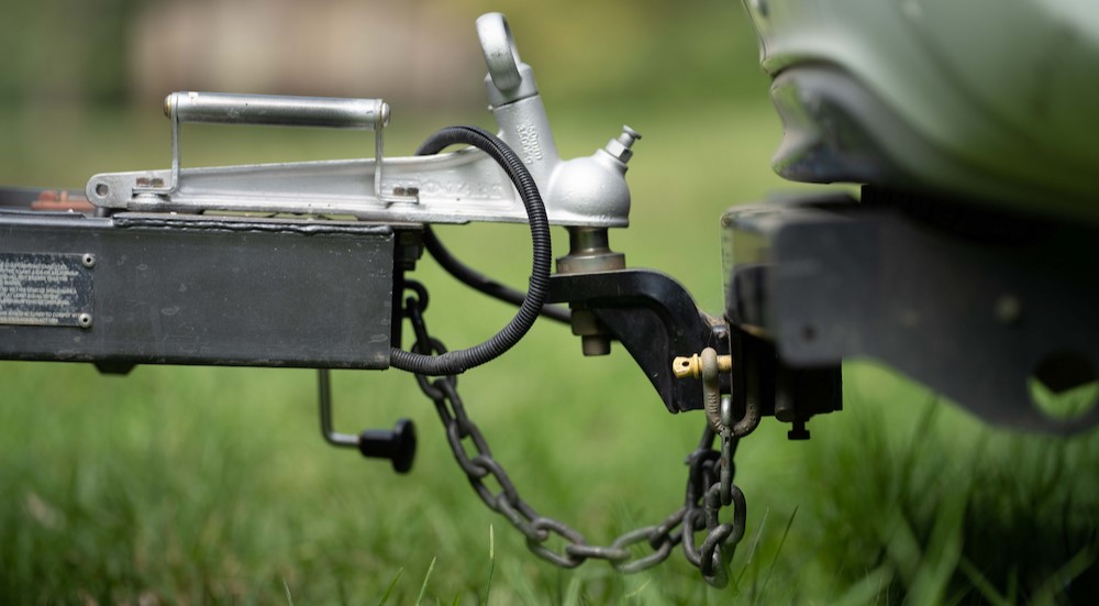 Close-up of a trailer hitched to a vehicle.