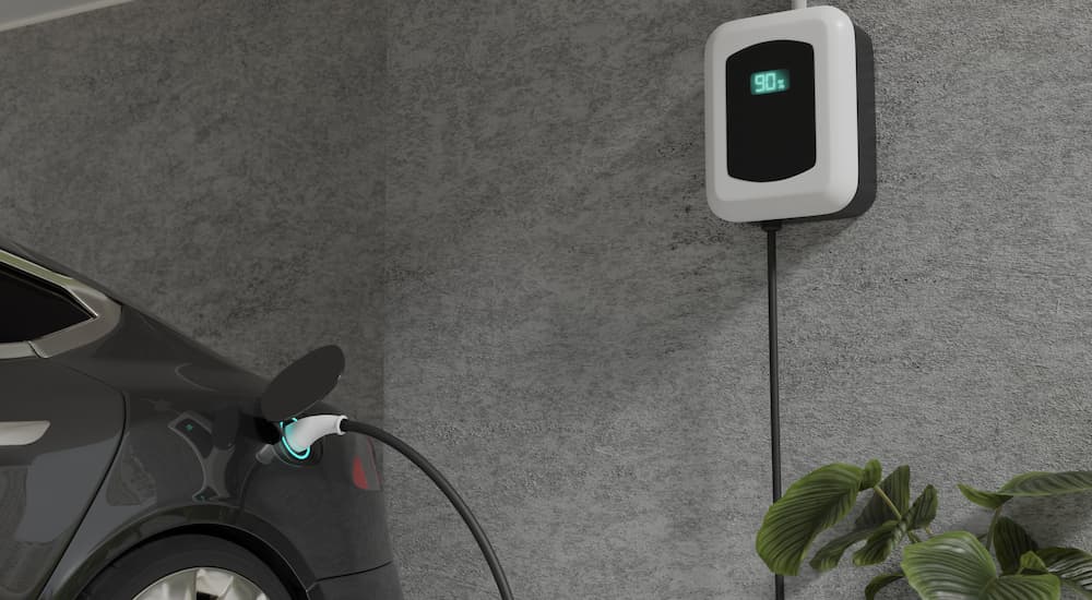 A car plugged into a home car charger