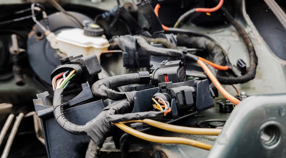 Wiring in an engine bay.