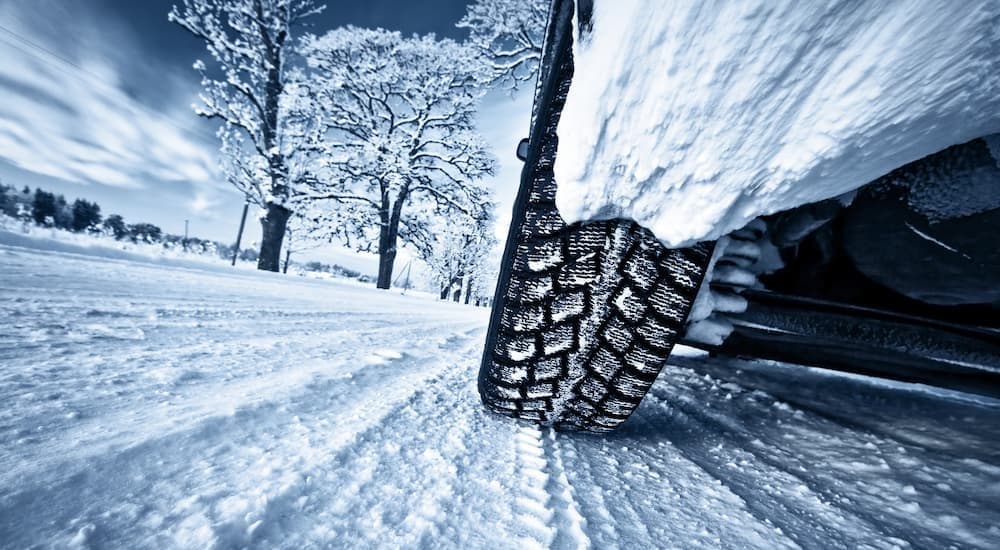 Close-up of a tire on snow.