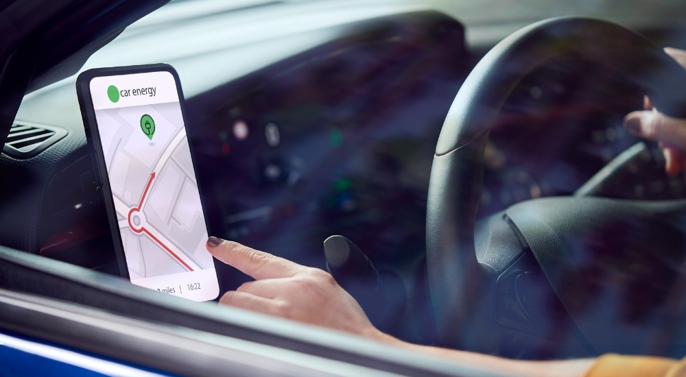 Phone mount holding phone while displaying GPS