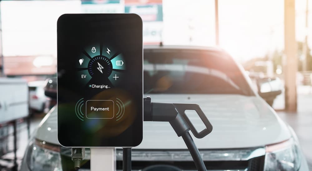 A vehicle at a charge station.