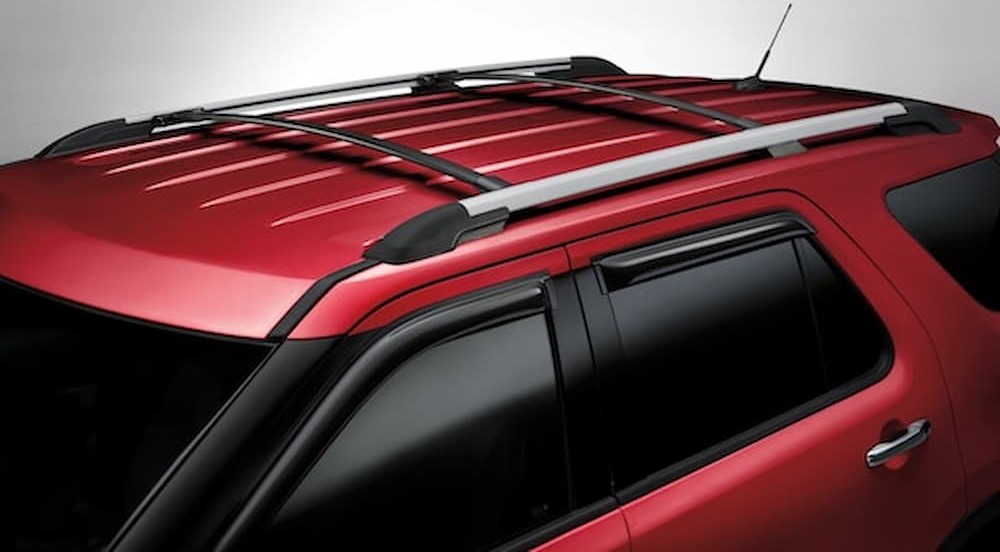 Roof rails on a red SUV.